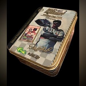 Like new, Dale Earnhardt metal collector cards in tin